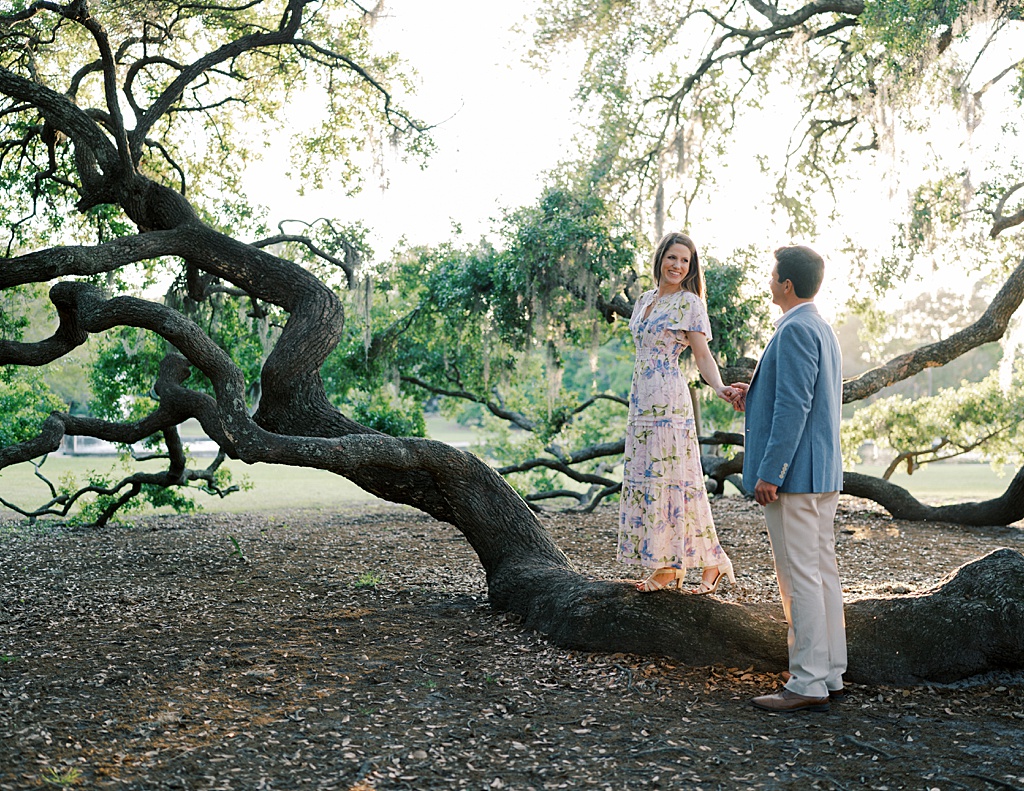 Couple on oak trees in Hampton Park