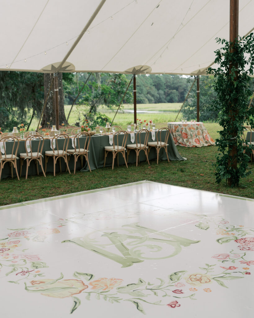 Colorful and custom monogrammed dance floor at wedding