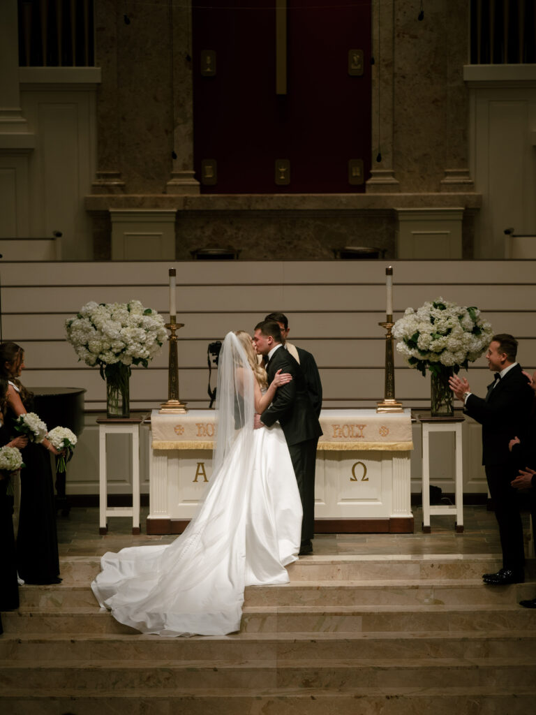 Couple share first kiss after vows