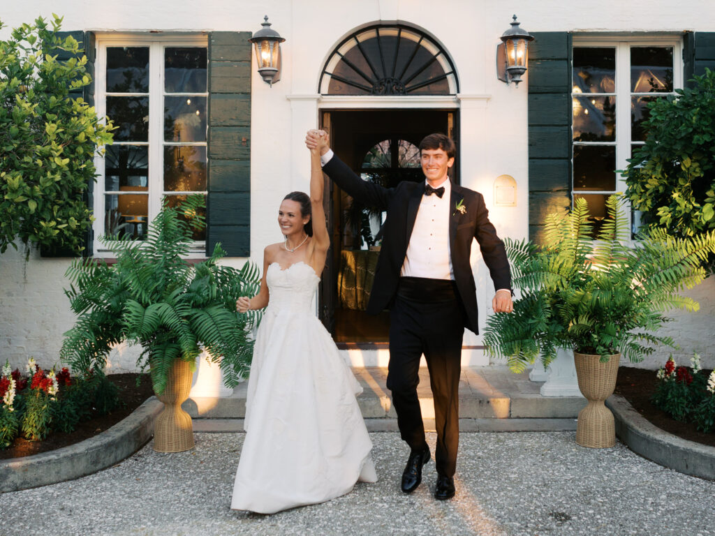 Bride and groom enter the reception space