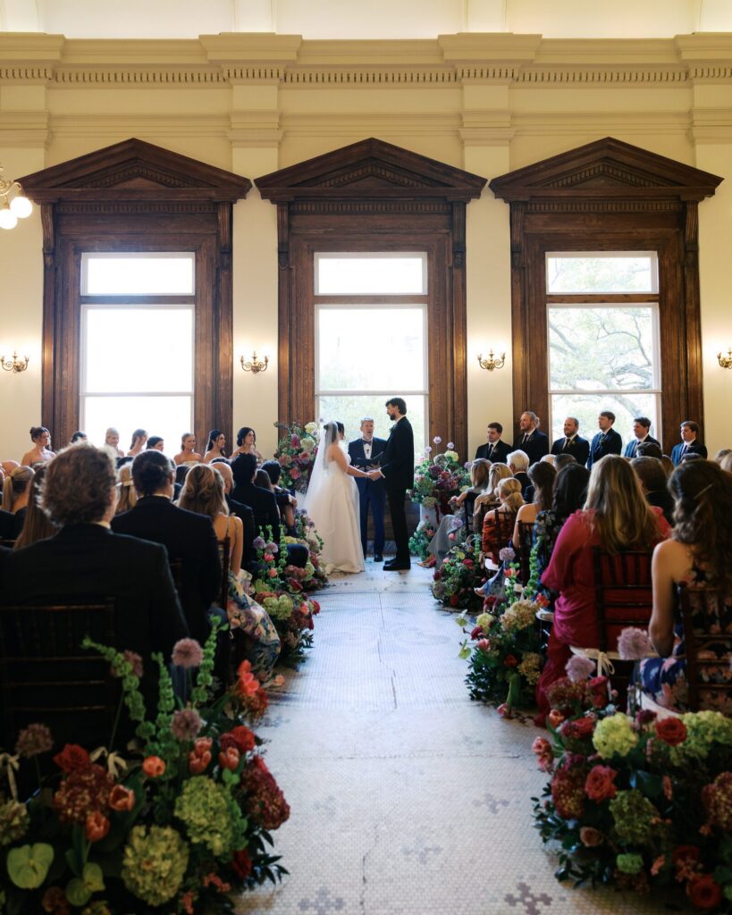 Wide shot of a wedding ceremony at the Gibbes Museum, Charleston