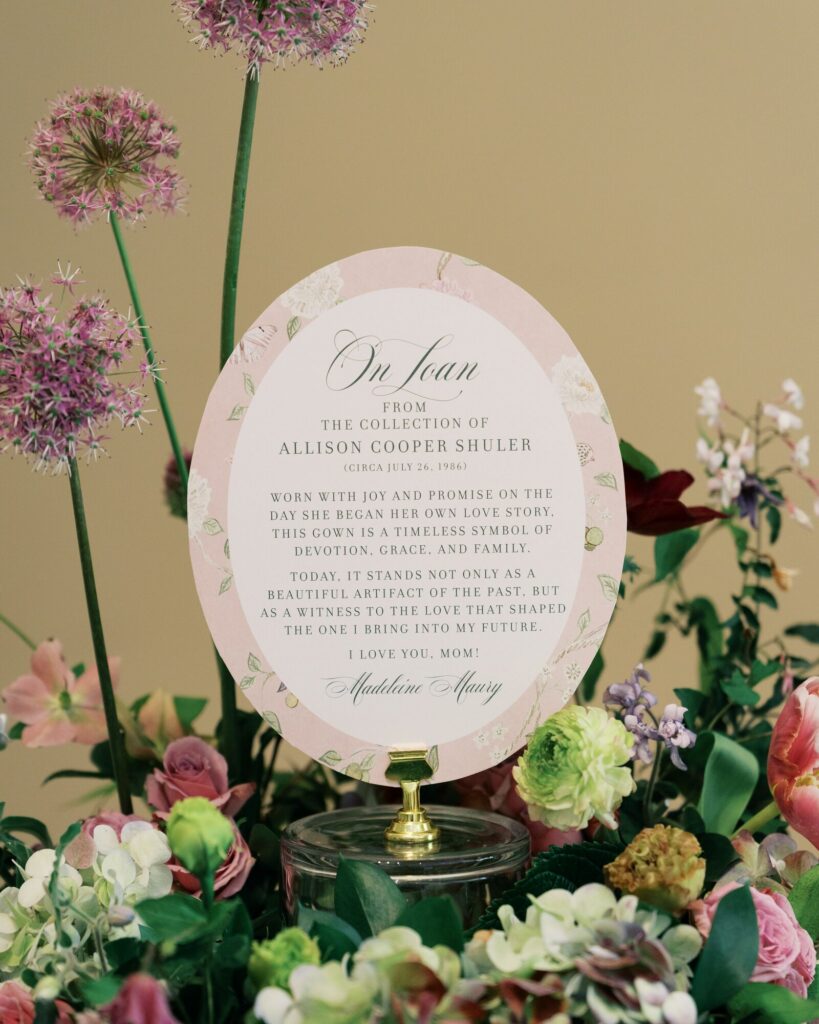 Description card of bride's mother's wedding dress displayed at a Gibbes Museum wedding